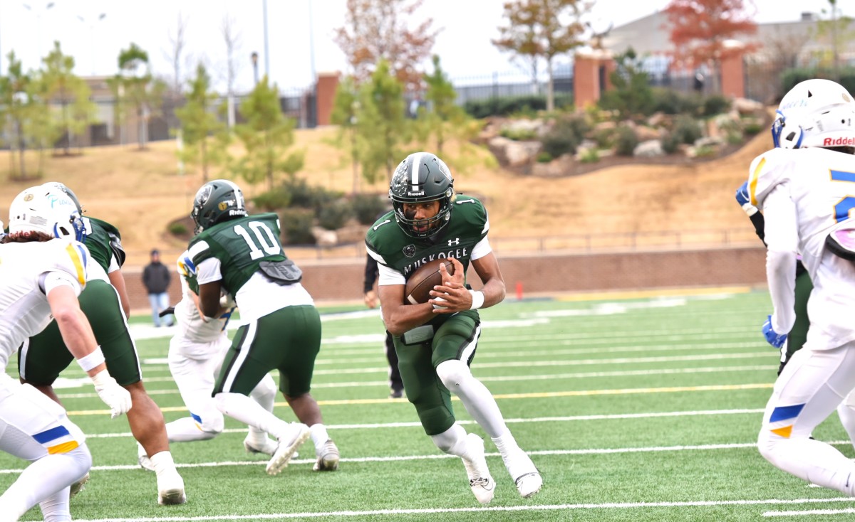 Muskogee quarterback Jamarian Ficklin (with ball) by Michael Kinney 